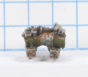 Drum cut in half and filled with scrap